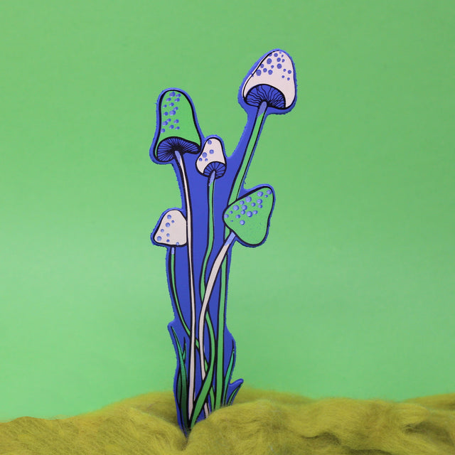 An illustrated blue leather mushroom bookmark