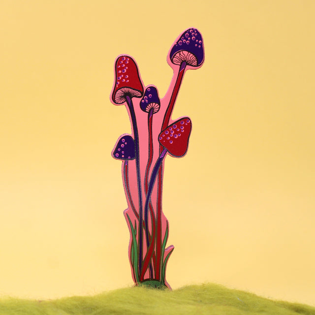 An illustrated pink leather mushroom bookmark