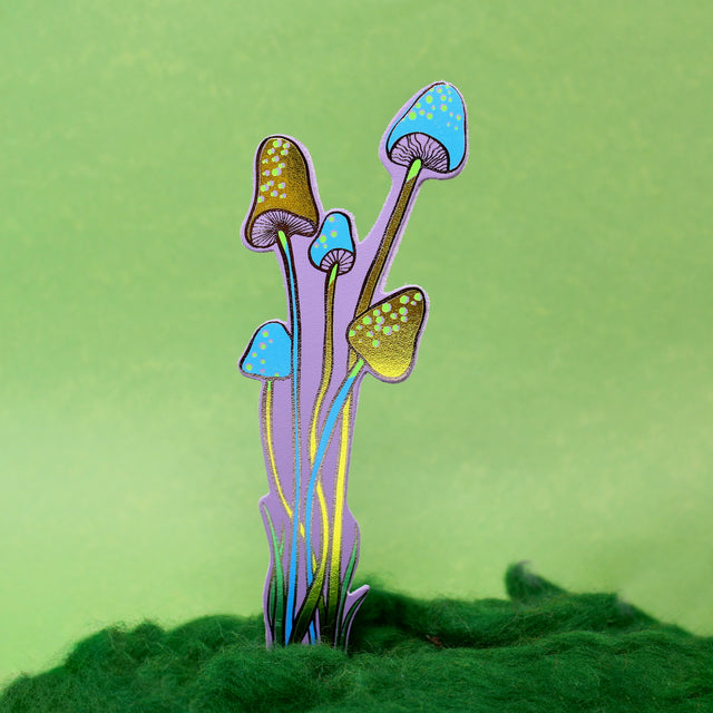 An illustrated lilac leather mushroom bookmark