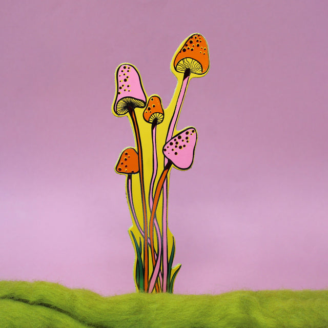 An illustrated yellow leather mushroom bookmark